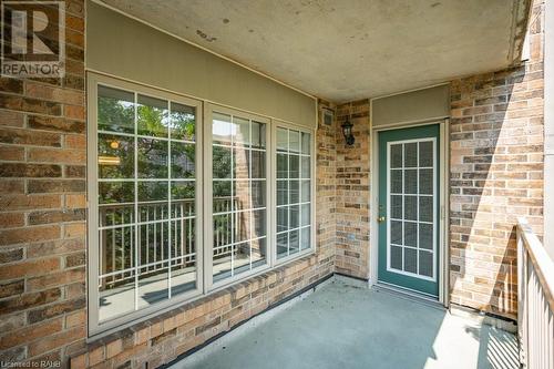 Spacious balcony with screen door off of living room! - 216 Plains Road W Unit# D307, Burlington, ON - Outdoor With Exterior