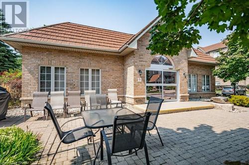 Outdoor barbecue and seating area! - 216 Plains Road W Unit# D307, Burlington, ON - Outdoor With Deck Patio Veranda