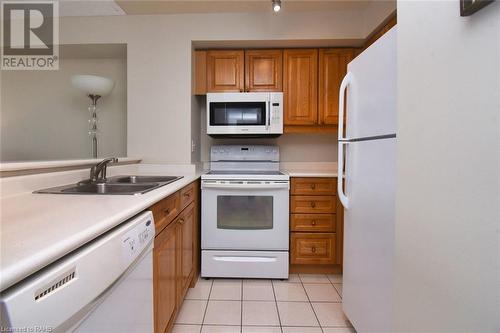 1276 Maple Crossing Boulevard Unit# 1508, Burlington, ON - Indoor Photo Showing Kitchen With Double Sink