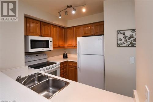 1276 Maple Crossing Boulevard Unit# 1508, Burlington, ON - Indoor Photo Showing Kitchen With Double Sink