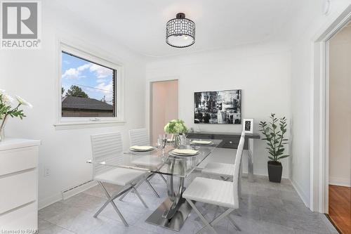 Virtually staged - 40 Robroy Avenue, Hamilton, ON - Indoor Photo Showing Dining Room