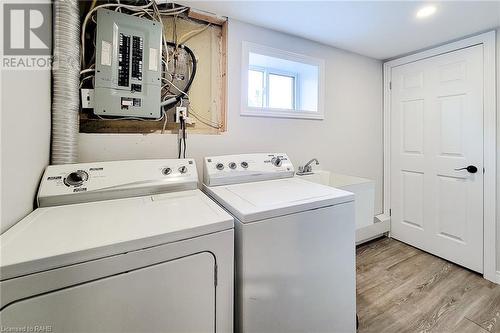 Shared laundry37217302to both floors - 44 Welbourn Drive, Hamilton, ON - Indoor Photo Showing Laundry Room