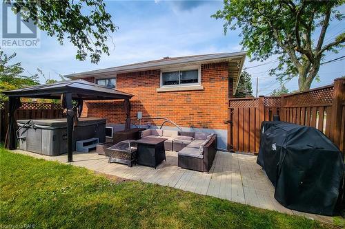 Backyard patio and hot tub - 44 Welbourn Drive, Hamilton, ON - Outdoor With Deck Patio Veranda With Exterior