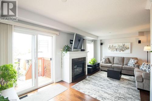 334 Pinehill Drive, Stoney Creek, ON - Indoor Photo Showing Living Room With Fireplace