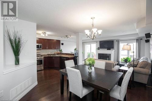 334 Pinehill Drive, Stoney Creek, ON - Indoor Photo Showing Dining Room With Fireplace