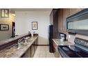 1500 Mcdonald  Avenue Unit# 415, Fernie, BC  - Indoor Photo Showing Kitchen With Double Sink 