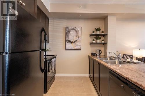 5010 Corporate Drive Unit# 239, Burlington, ON - Indoor Photo Showing Kitchen With Double Sink