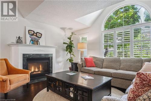 1150 Skyview Drive Unit# 18, Burlington, ON - Indoor Photo Showing Living Room With Fireplace