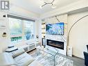 2530 Eglinton Avenue W Unit# 109, Mississauga, ON  - Indoor Photo Showing Living Room With Fireplace 