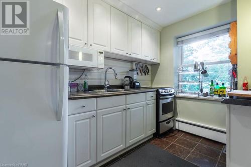 40 Robinson Street Unit# 307, Hamilton, ON - Indoor Photo Showing Kitchen With Double Sink