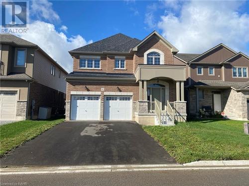 Front exterior - 2 parking spaces on the right side of the driveway plus the garage included with the lease - 37 Homestead Way Unit# Upper, Thorold, ON - Outdoor With Facade