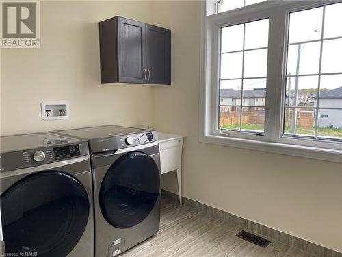 Upper level laundry room - 37 Homestead Way Unit# Upper, Thorold, ON - Indoor Photo Showing Laundry Room