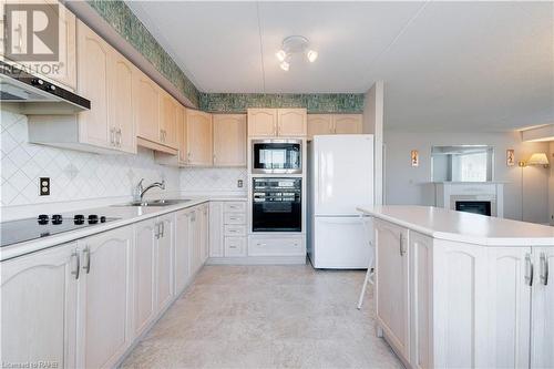 870 Upper Wentworth Street Unit# 202, Hamilton, ON - Indoor Photo Showing Kitchen With Double Sink