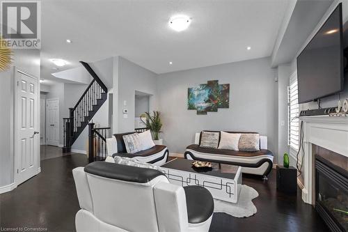 7 Atessa Drive Unit# 11, Hamilton, ON - Indoor Photo Showing Living Room With Fireplace