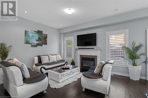 7 Atessa Drive Unit# 11, Hamilton, ON - Indoor Photo Showing Living Room With Fireplace