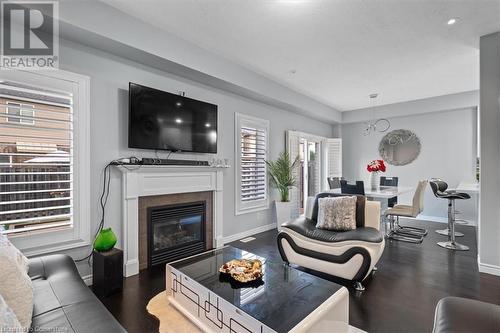 7 Atessa Drive Unit# 11, Hamilton, ON - Indoor Photo Showing Living Room With Fireplace