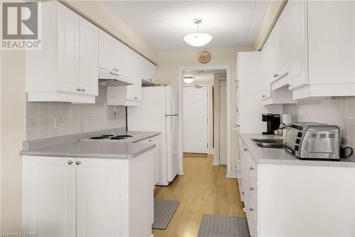 600 Silverbirch Boulevard Unit# 203, Mount Hope, ON - Indoor Photo Showing Kitchen With Double Sink