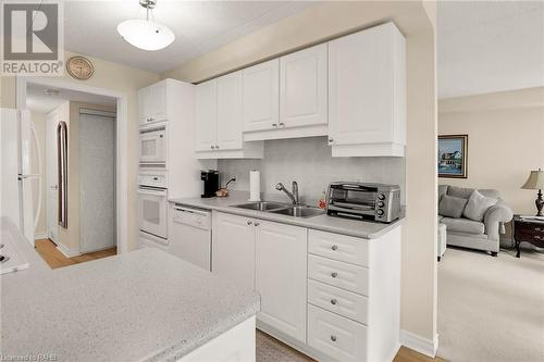 600 Silverbirch Boulevard Unit# 203, Mount Hope, ON - Indoor Photo Showing Kitchen With Double Sink