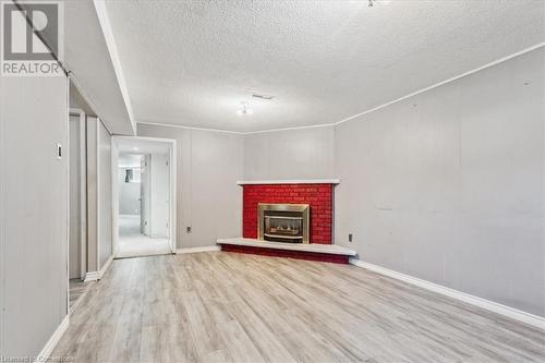 4012 Kingston Court, Burlington, ON - Indoor Photo Showing Living Room With Fireplace