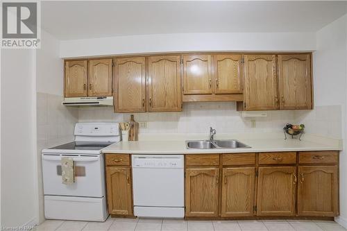 3050 Pinemeadow Drive Unit# 56, Burlington, ON - Indoor Photo Showing Kitchen With Double Sink