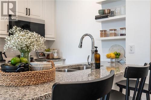 85 Robinson Street Unit# 1002, Hamilton, ON - Indoor Photo Showing Kitchen With Double Sink