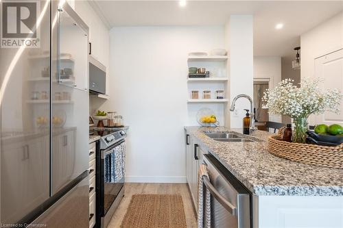 85 Robinson Street Unit# 1002, Hamilton, ON - Indoor Photo Showing Kitchen With Double Sink