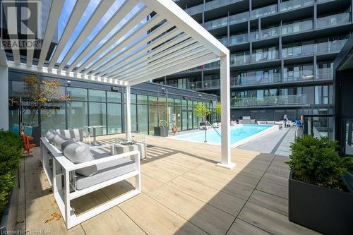 3200 Dakota Common Boulevard Unit# 604, Burlington, ON - Outdoor With In Ground Pool