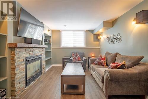 8855 Silverstar Court, Niagara Falls, ON - Indoor Photo Showing Living Room With Fireplace