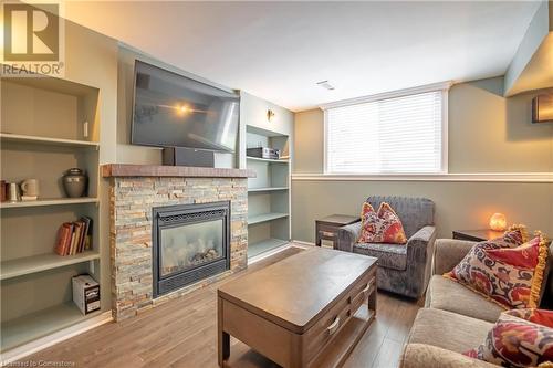 8855 Silverstar Court, Niagara Falls, ON - Indoor Photo Showing Living Room With Fireplace