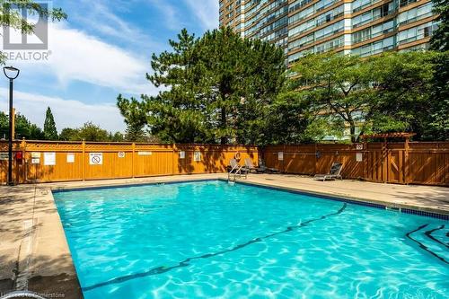 1276 Maple Crossing Boulevard Unit# 310, Burlington, ON - Outdoor With In Ground Pool With Backyard