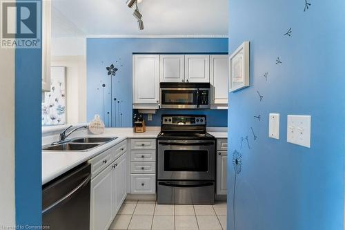 1276 Maple Crossing Boulevard Unit# 310, Burlington, ON - Indoor Photo Showing Kitchen With Double Sink