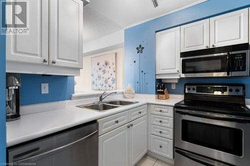 1276 Maple Crossing Boulevard Unit# 310, Burlington, ON - Indoor Photo Showing Kitchen With Double Sink