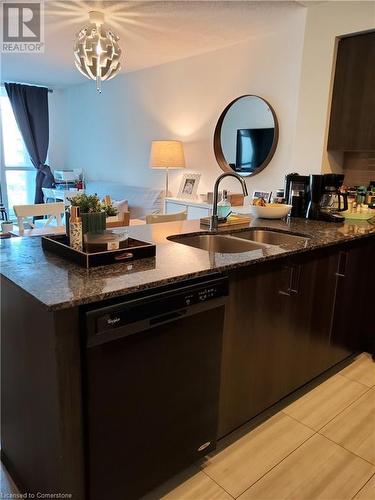 80 Esther Lorrie Drive Drive Unit# 403, Toronto, ON - Indoor Photo Showing Kitchen With Double Sink