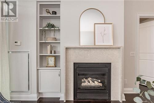 11 Bronte Road Unit# 516, Oakville, ON - Indoor Photo Showing Living Room With Fireplace