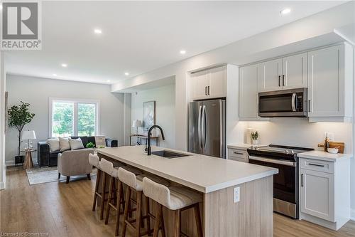 Effortless flow to Dining and Living areas - 80 Fernridge Common, St. Catharines, ON - Indoor Photo Showing Kitchen With Upgraded Kitchen