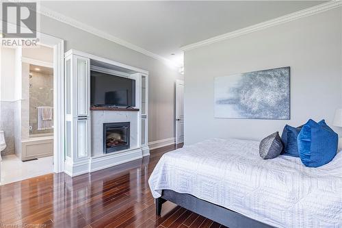 14 Wisteria Lane, York, ON - Indoor Photo Showing Bedroom With Fireplace