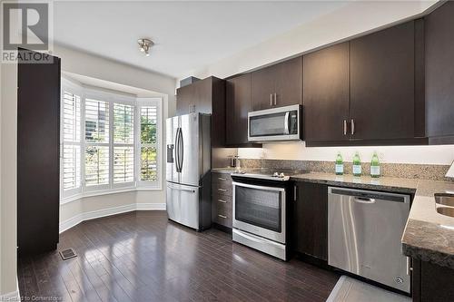 Kitchen w/ stainless steel appliances - 132 Six Point Road, Toronto, ON - Indoor Photo Showing Kitchen