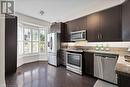 Kitchen w/ stainless steel appliances - 132 Six Point Road, Toronto, ON  - Indoor Photo Showing Kitchen 