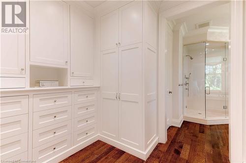 Meticulously designed floor to ceiling custom wardrobe cabinetry by Hallmark. - 183 Mill Street, Hamilton, ON - Indoor Photo Showing Other Room