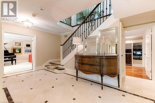 Foyer features custom marble heated floors. - 183 Mill Street, Hamilton, ON - Indoor Photo Showing Other Room