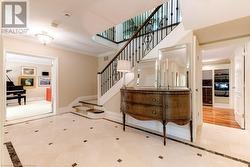 Foyer features custom marble heated floors. - 