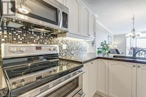 KITCHEN - 1998 Ironstone Drive Unit# 409, Burlington, ON - Indoor Photo Showing Kitchen