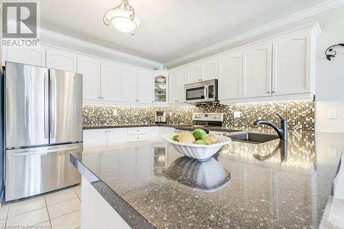 KITCHEN - 1998 Ironstone Drive Unit# 409, Burlington, ON - Indoor Photo Showing Kitchen