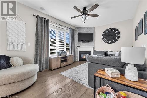 8 Saybrook Gardens, Stoney Creek, ON - Indoor Photo Showing Living Room With Fireplace