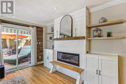 9 Newell Court, Hamilton, ON - Indoor Photo Showing Other Room With Fireplace