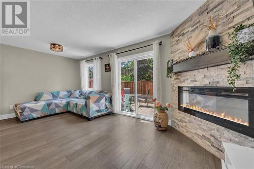 2200 Glenwood School Drive Unit# 42, Burlington, ON - Indoor Photo Showing Bedroom With Fireplace