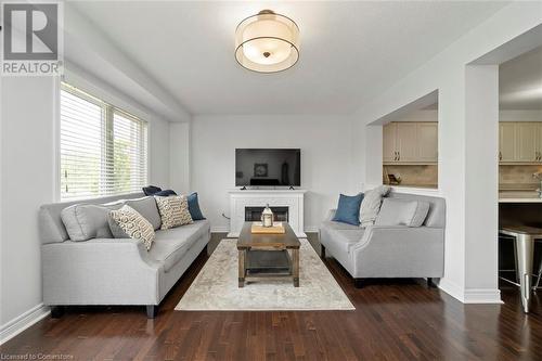 1035 Victoria Road S Unit# 119, Guelph, ON - Indoor Photo Showing Living Room With Fireplace