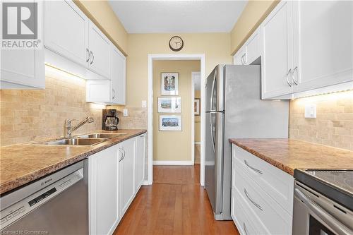 180 Limeridge Road W Unit# 702, Hamilton, ON - Indoor Photo Showing Kitchen With Double Sink