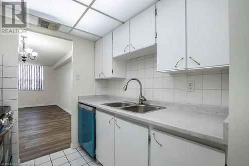 4 Lisa Street Unit# 712, Brampton, ON - Indoor Photo Showing Kitchen With Double Sink