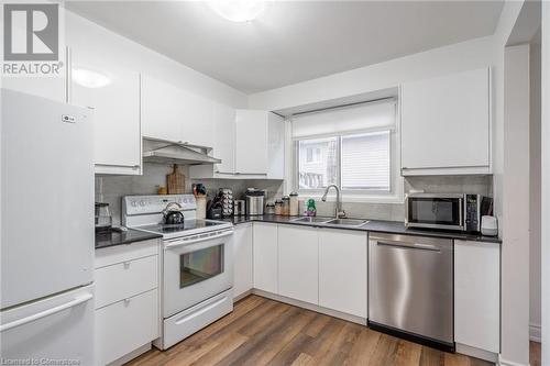 596 Grey Street Unit# 8, Brantford, ON - Indoor Photo Showing Kitchen With Double Sink